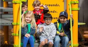 Kids Sitting and Smiling playground